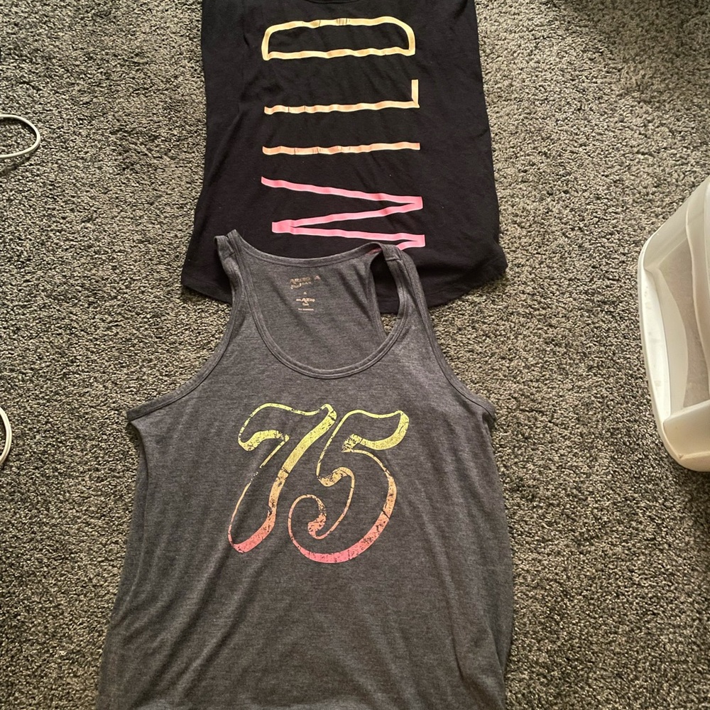 2 tanks Gray was worn maybe once (XL fits like L!) Black is L and is well worn